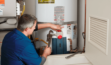 Plumber fixing Heater